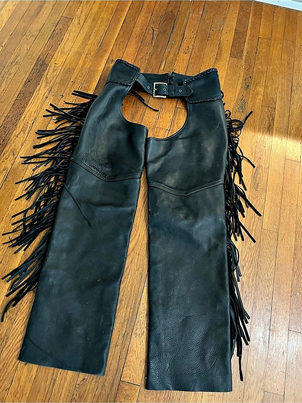 Woman's Black Leather Chaps with Fringe
waste Fits up to a 32